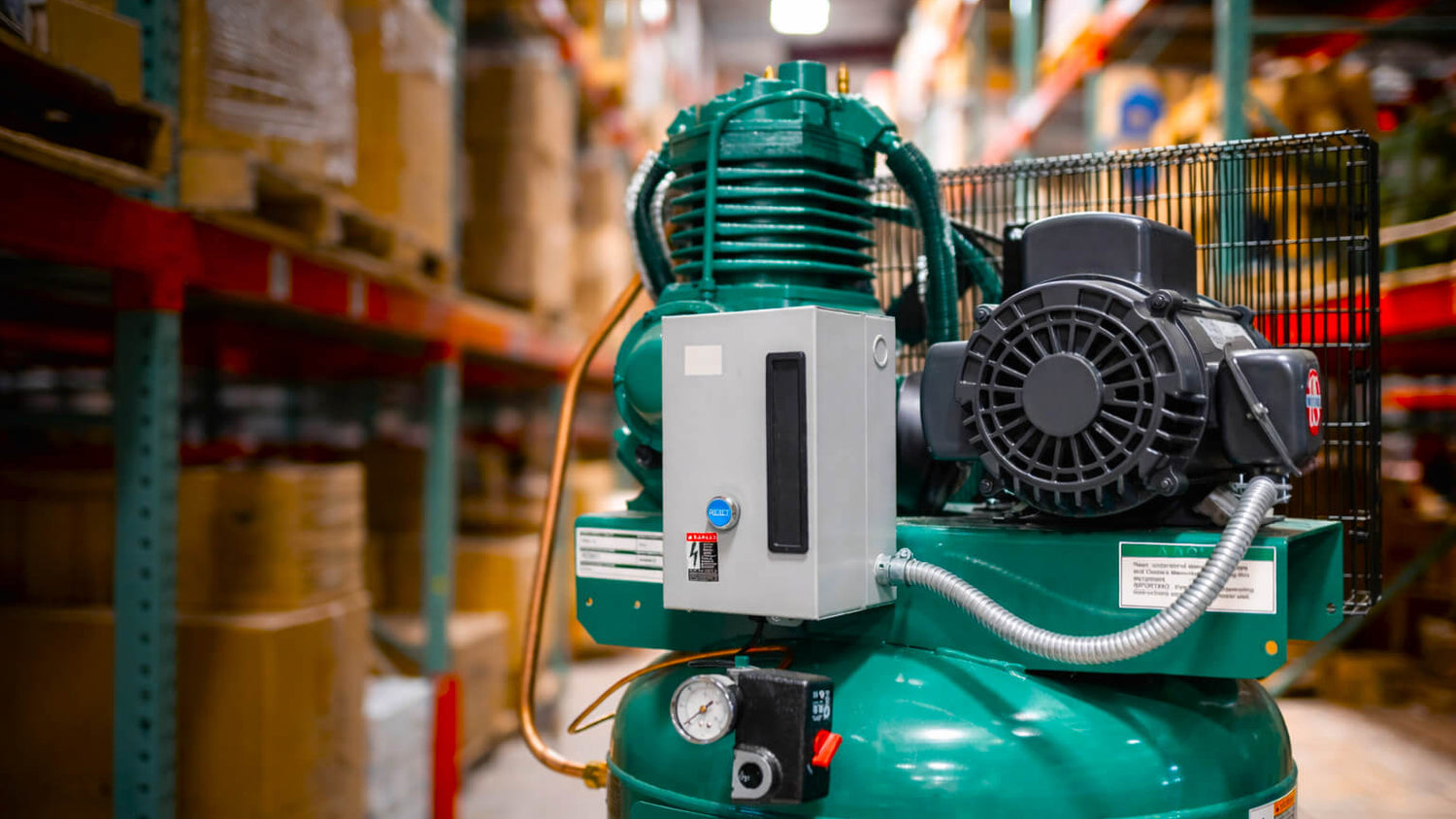 Green air compressor in the compressor source warehouse