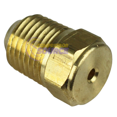 Gold brass fitting on a white background